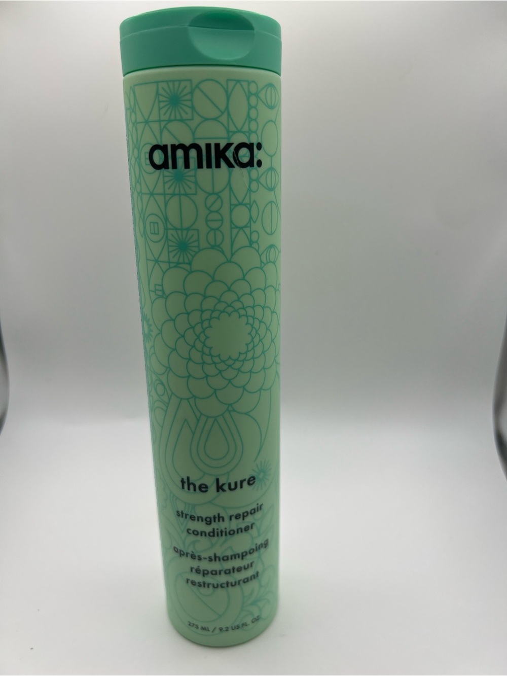 amika Mint Green Strength Repair Conditioner Bottle